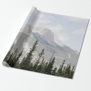 GREEN PINE TREES NEAR MOUNTAIN UNDER WHITE CLOUDS WRAPPING PAPER