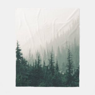 GREEN PINE TREES ON FOGGY WEATHER FLEECE BLANKET