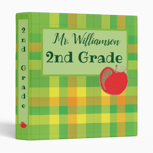 Green plaid teacher binder with a red apple