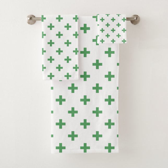 Green polka crosses on white bath towel set (Insitu)