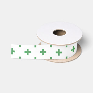 Green polka crosses on white satin ribbon