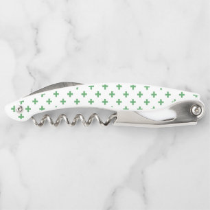 Green polka crosses on white waiter's corkscrew