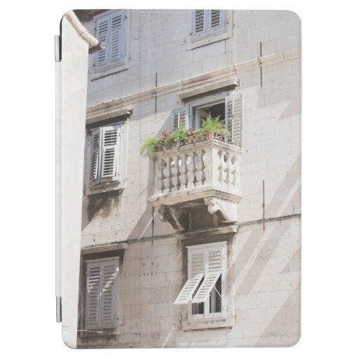 GREEN POTTED PLANT ON BROWN CONCRETE HOUSE BALCONY iPad AIR COVER