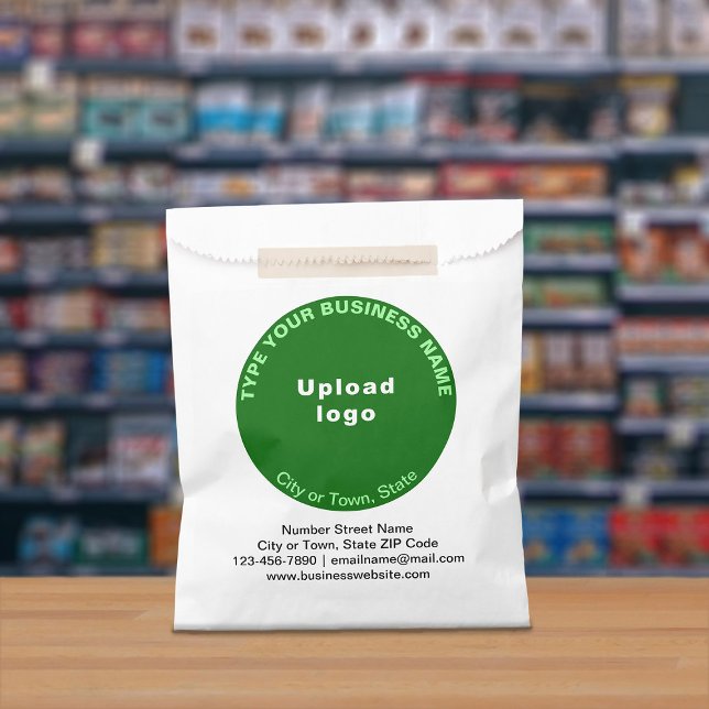 Green Round Business Brand on Paper Bag (Paper bag with green round business branding displayed in a store)