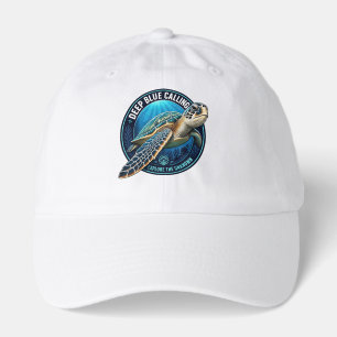 Green sea turtle inside a round ocean emblem. hat