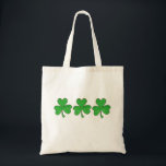 Green Shamrock Clovers Lucky St. Patrick's Day Tote Bag<br><div class="desc">Tote bag features a row of bright green shamrocks,  created from an original marker illustration. Perfect for St. Patrick's Day!

This St. Patrick's Day design is also available on other products. Don't see what you're looking for? Need help with customization? Contact Rebecca to have something designed just for you.</div>