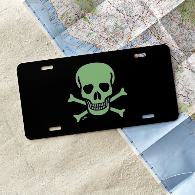 Green Skull black aluminum car license plate (In Situ)