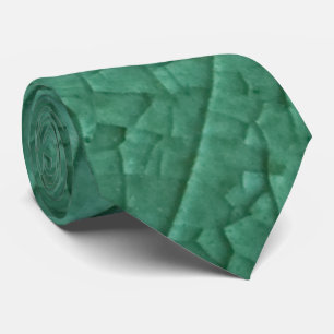 Green stone cracks tie