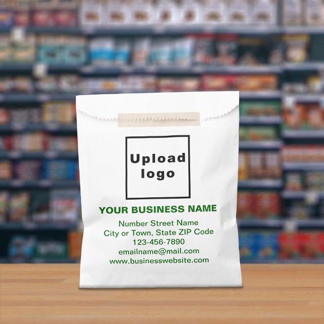 Green Text Business Brand on Paper Bag (Paper bag with green text business branding displayed in a store)