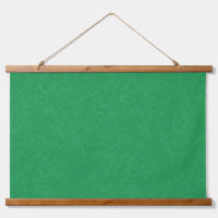 Green textured surface with swirling pattern