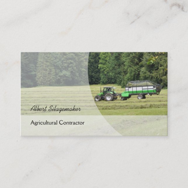 Green tractor with a silage laden trailer business card (Front)