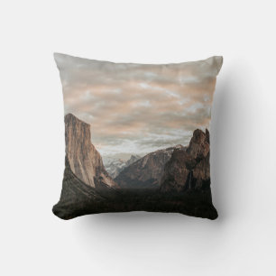 GREEN TREES NEAR BROWN MOUNTAIN UNDER CLOUDY SKY D THROW PILLOW