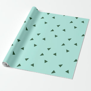 Green triangles on blue wrapping paper