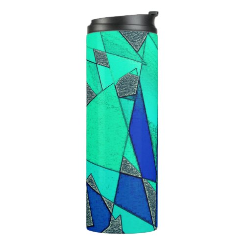 Green triangular cutouts on blue background rough thermal tumbler