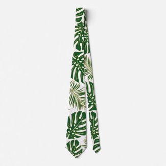 Green tropical monstera and palm leaves neck tie