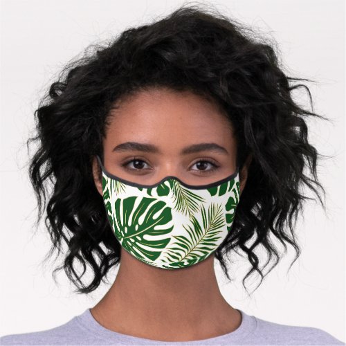 Green tropical monstera and palm leaves premium face mask