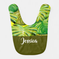 Green tropical palm leaves on yellow baby bib
