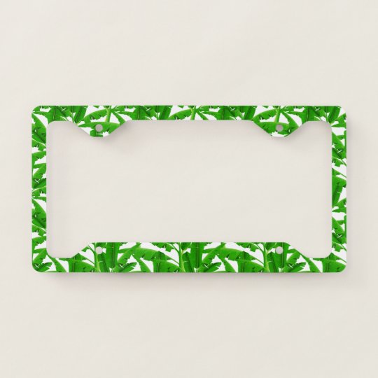 Green tropical palm trees license plate frame