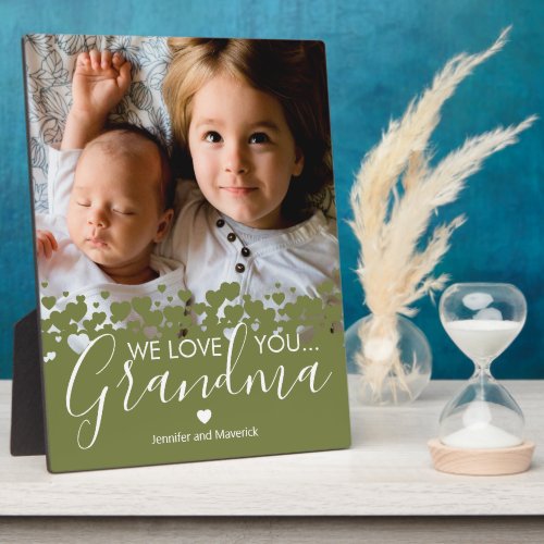 Green We Love You Grandma Photo Plaque - Personalized grandmother photo plaque featuring a precious family photo, a botanical green heart border design, the saying "we love you grandma", and the childrens names.