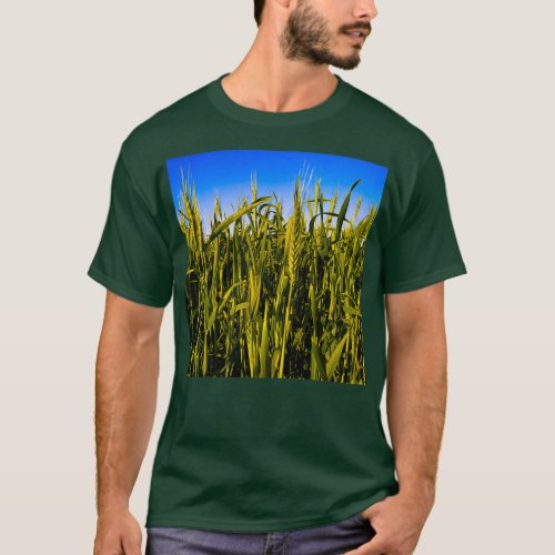 Green wheat plants with ears growing in the field T_Shirt