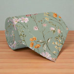 Green Wildflower Garden Flowers Spring Meadow Neck Tie<br><div class="desc">Freshen up your formalwear with this Green Wildflower Garden neck tie, featuring a calming mix of soft meadow flowers and lush green tones. Perfect for spring and summer occasions, this nature-inspired accessory adds an earthy, elegant touch to weddings, garden parties, and everyday outfits. The floral pattern is subtle yet expressive—ideal...</div>