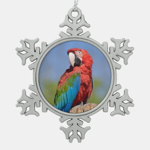 Green_winged macaw perched snowflake pewter christmas ornament