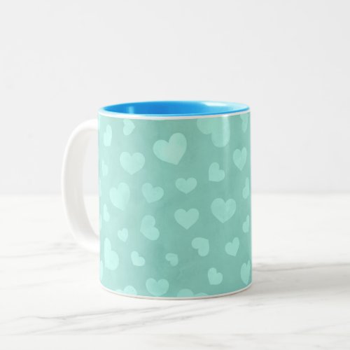 Green with white hearts  light blue interior mug