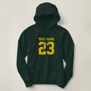 Green women's hoodie with custom jersey number