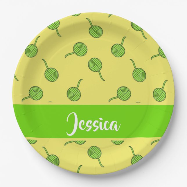 Green wool rolls on yellow paper plates (Front)