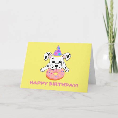 Greeting card with cute Dalmatian puppy with donut
