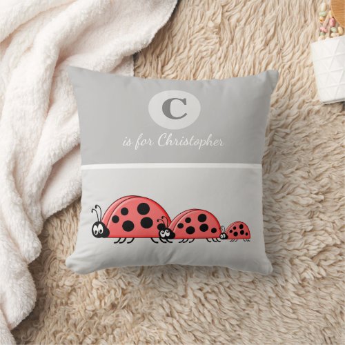 Grey and red with a cute ladybird family baby name throw pillow