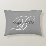Grey Black and White Fancy Wedding Monogram Accent Pillow<br><div class="desc">A couple's monogram with a fancy calligraphy script in black and white against a grey solid color background. 
You can customize the colors in this typography design or the fancy and elegant calligraphy styles. 
An accent pillow wedding gift for the newly weds. 
Black,  white and grey home decor.</div>