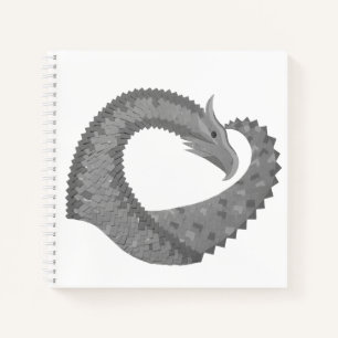 Grey heart dragon on white notebook