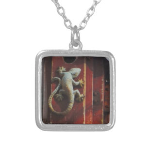 grey lizard on worn wood silver plated necklace