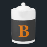 Grey orange modern monogrammed professional teapot<br><div class="desc">It is an excellent product that will make you say "how simple but impressive a design". Why not pamper yourself with such a design?</div>