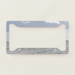 Grey sea and pretty clouds license plate frame