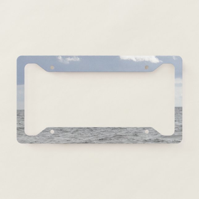 Grey sea and pretty clouds license plate frame (Front)