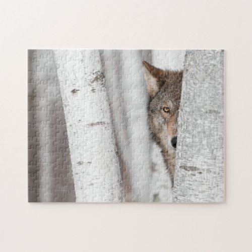 Grey Wolf Canis lupus Behind Tree Jigsaw Puzzle