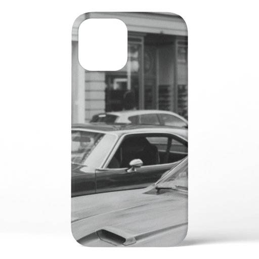 GREYSCALE PHOTOGRAPHY OF CARS ON ROAD BESIDE BUILD iPhone 12 CASE