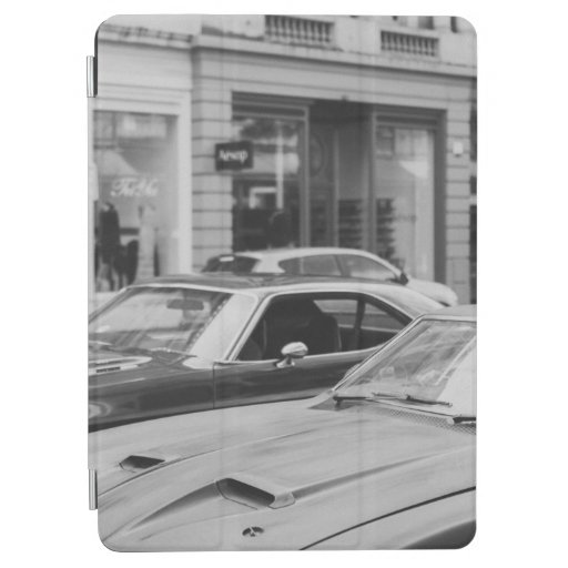 GREYSCALE PHOTOGRAPHY OF CARS ON ROAD BESIDE BUILD iPad AIR COVER