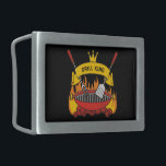 Grill King Belt Buckle<br><div class="desc">Barbecue grill over flaming charcoal,  scroll banner with custom text over fork and spatula. Custom background color.</div>