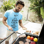 Grill On T-Shirt<br><div class="desc">Light blue basic t-shirt with “Keep Calm and Grill On” in bold black letters topped with barbeque utensils and a hotdog. See the entire Father's Day Apparel collection in the SPECIAL TOUCHES | Party Favors section.</div>
