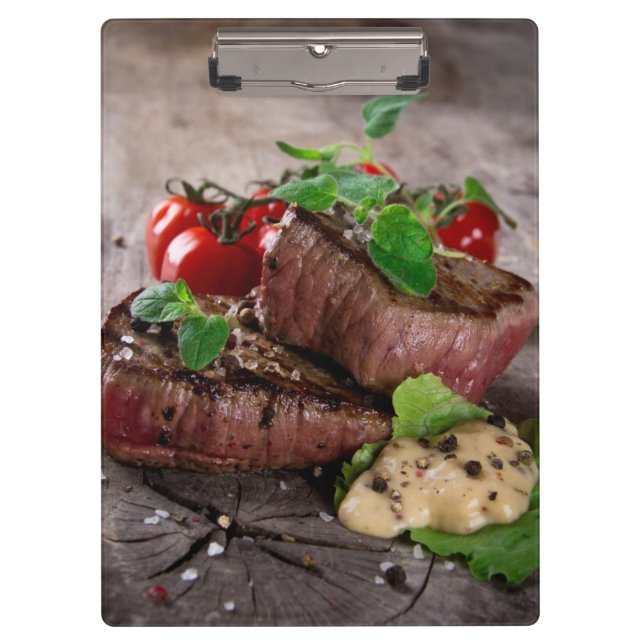 Grilled bbq steaks with fresh herbs and tomatoes clipboard (Front)