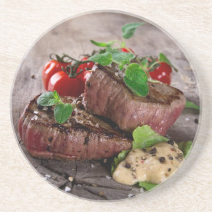 Grilled bbq steaks with fresh herbs and tomatoes drink coaster