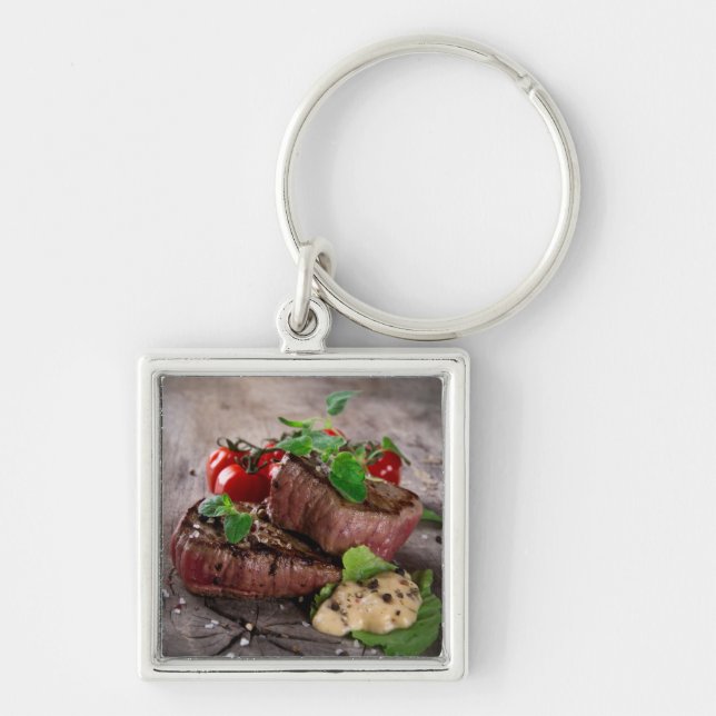 Grilled bbq steaks with fresh herbs and tomatoes keychain (Front)