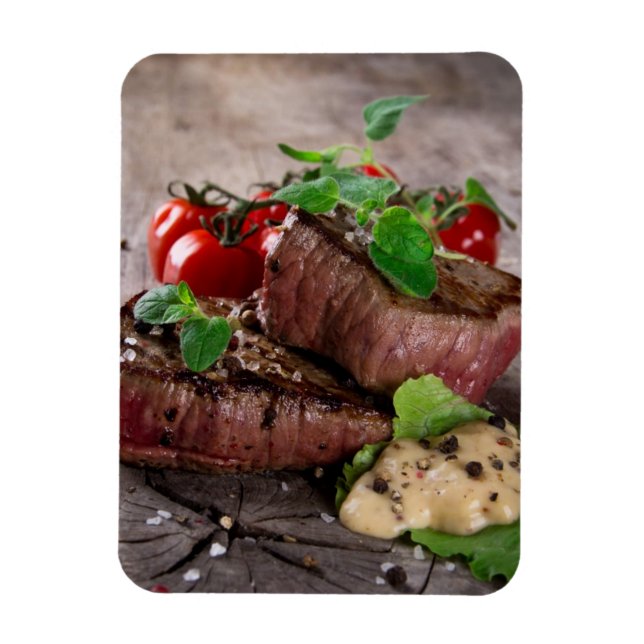 Grilled bbq steaks with fresh herbs and tomatoes magnet (Vertical)