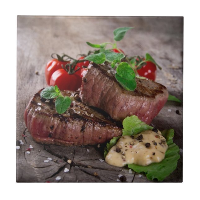 Grilled bbq steaks with fresh herbs and tomatoes tile (Front)