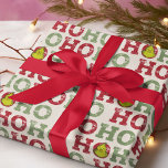 Grinch Ho Ho Ho Pattern Wrapping Paper<br><div class="desc">The holidays will not be complete without Grinch!  HOW Grinch STOLE CHRISTMAS is a classic story of a town called Who-ville and how the Christmas spirit can melt even the coldest of hearts.</div>