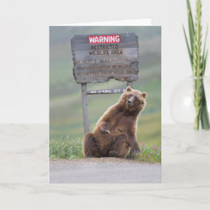 Grizzly Bear Plays With Sign Card