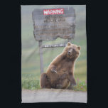 Grizzly Bear Plays With Sign Kitchen Towel<br><div class="desc">Grizzly bear scratches a roadside sign in Sable Pass,  Denali National Park,  Alaska</div>